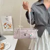 Bolsa de Ombro Feminina Doce com Laço 2026 Nova Coreana de Luxo Leve Nicho Bolsa Baguete Bolsa de Ombro Fofa para Menina