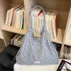 Bolsa de axila fresca e doce estilo coreano transfronteiriça, bolsa tote casual versátil, nova bolsa de ombro simples 2026