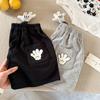 Pantalones cortos para niños 2025 entrecerrando los ojos verano nuevo niños y niñas pantalones cortos de dibujos animados tridimensionales pantalones casuales para bebé moda
