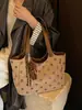 Bolsa de balde fashion de grande capacidade transfronteiriça com bolinhas, coleção de outono, bolsa de trabalho feminina, bolsa de ombro e bolsa de mão modernas e versáteis