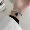 Otoño e Invierno nuevo collar negro de amor diseño de nicho femenino estilo dulce y fresco Cadena de clavícula de perlas Accesorios de Moda Venta al por Mayor