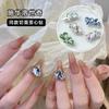 Celebridad de Internet Groove Corazón Torcido Diamante Arte de Uñas Joyería Diamante Facetado Corazón Torcido Exquisito Hielo Transparente Explosión Decoración de Uñas Usable Al Por Mayor
