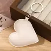 Pingente de chaveiro em formato de coração grande de couro em estoque do fabricante, pingente de chaveiro em formato de coração tridimensional com enchimento de algodão, material de couro