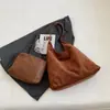 Bolsa mãe-filho de camurça cor sólida retrô versátil personalizável para o inverno 2026 nova bolsa de ombro única com textura de transferência de calor quente