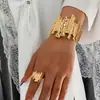 Conjunto de pulsera abierta y anillo de diseño geométrico de metal transfronterizo europeo y americano para mujer, joyería de estilo punk retro exagerado