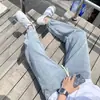 Jeans Cropped Masculino Elástico na Cintura Solto para Todas as Estações Calças Harem Casuais Cor Clara Marca Tendência