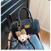 Bolso cruzado retro casual simple transfronterizo para mujer con un toque de alta gama, bolsa Boston tipo almohada versátil, diseño para el trabajo cruzado