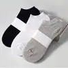 Calcetines calcetines de media pantorrilla para hombre color liso primavera y verano calcetines deportivos de baloncesto absorbentes de sudor unisex calcetines de moda geniales
