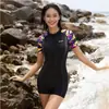 Traje de baño de una pieza de nuevo estilo para mujer, de manga corta, conservador, adelgazante, que cubre el abdomen, traje de baño para aguas termales, traje de baño deportivo con cremallera