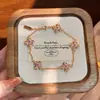 Xiaohongshu Dropshipping Nuevo Pulsera de Cinco Flores con Mazo Vajra de Estilo Chino para Mujer, Joyería de Pulsera con Diseño Elegante y de Lujo Ligero
