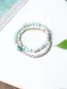 Pulseira Duplo Círculo Bodhi Estrela e Lua para Mulheres, Nova Pulseira de Contas Budista Estilo Chinês, Joias Étnicas de Luxo Leve de Nicho Venda por Atacado