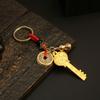 Llavero con colgante de llave de coche y bolso de hombre y mujer con el símbolo del zodiaco Piscis de latón dorado.