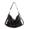 Bolso de mano de nicho coreano, bolso de hombro, bolso de axila, bolso cruzado, bolso de motociclista para mujer, bolso tote de estilo ins de alta gama, gran capacidad para el trabajo