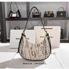 Bolso de mujer al por mayor diseño nicho bolso de mano bolso media luna 2024 nuevo versátil baguette francesa bolso de hombro de alta gama
