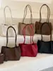 Bolsa de grande capacidade para deslocamento casual transfronteiriço para mulheres, novo modelo 2026, simples, fresca, personalizada, moderna, de ombro único, de axila, sacola