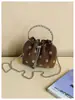 Bolso de lunares de nicho súper popular para mujer, nuevo bolso cruzado versátil vintage otoño e invierno 2026, exquisito bolso de cubo de mano