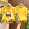 Camiseta base de manga larga tipo dos piezas para niña, nuevo estilo primavera/otoño 2026, camiseta de algodón puro con cuello redondo, corte holgado para niños mayores