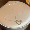 Collar de Acero de Titanio con Forma de Corazón de Venta Caliente Estilo Ins Japonés y Coreano Moda Pequeño Público Estilo Blanco para Viajes Cotidianos Joyería para Mujer que No Cae