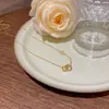 Joyería Transfronteriza Europea y Americana Moda y Exquisito Colgante Nicho Cadena Clavicular No Descolorante Oro de 18K Acero Titanio Accesorios de Collar para Mujer