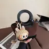 Bolso de mano de alta gama para mujer 2026 nuevo otoño nicho súper popular bolso de hombro para el trabajo y los desplazamientos bolso cruzado tipo cubo