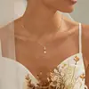 Collar de Oro para Mujer con Colgante de Perla Europeo y Americano Transfronterizo, Moderno y Versátil, Diseño Elegante y con Estilo, Cadena para Clavícula para Citas