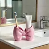 Soporte para cepillos de dientes con forma de lazo Sin instalación Plástico Soporte de almacenamiento Baño Dormitorio Tipo bolígrafo Soporte de exhibición para cepillos de dientes