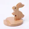 Soporte de Teléfono Móvil de Conejo Giratorio de Madera Año del Conejo Zodiaco Soporte de Teléfono Móvil de Madera Maciza Tamaño Forma Logo Grabado