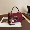Bolsa Pequena Quadrada Rígida Retro Simples de Nicho para Mulheres 2025 Nova Outono High-End Casual Tendência de Ombro Único Transversal