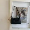 Bolso axila diario para mujer, nuevo bolso de hombro de moda primavera 2026, bolso cruzado versátil de alta gama
