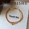 Moda Retro Simple Versátil Pulsera de Cuerda Roja Trenzada de Doble Capa con Circonita, con un Toque de Lujo Ligero y de Alta Gama, Joyería Elegante y con Estilo para Mujer