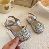 Sandalias tejidas caladas estilo francés, nueva versión coreana de verano 2026, zapatos de princesa con lazo para niñas para combinar con vestidos
