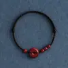 Un Brazalete de Cuerda Roja con Hebilla de Seguridad de Cinabrio de por Vida para Hombres y Mujeres en su Año Zodiacal, Brazalete Trenzado con Cuentas de Buena Suerte para Protegerse y Asegurar la Seguridad