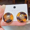 Pendientes de botón geométricos redondos de resina con estampado de leopardo, estilo vintage de lujo ligero, de alta gama y elegantes, modernos y versátiles para mujer, adecuados para el trabajo