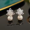 Pendientes de circonita con forma de flor para mujer, elegantes, de lujo, de alta gama, con luz, exquisitos y combinables, de plata 925, venta al por mayor