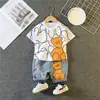 Fuente transfronteriza 23 ropa de bebé para niños dibujos animados cuello redondo manga corta pantalones cortos conjunto de dos piezas ropa para niños verano nueva ropa de verano
