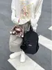 Mochila de lunares estilo coreano, bolsa ligera casual para exteriores y senderismo, bolsa versátil de nicho para laptop, mochila para estudiantes universitarios y de preparatoria