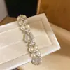 Pulsera Colgante con Perlas Chapada en Oro Real de 18 Quilates Zirconia Perla Pulsera de Perlas Lujo Ligero Joyería de Moda de Alta Gama para Mujeres