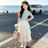 Conjunto de Verano para Niñas 2026 Nuevo Elegante de Seda de Hielo Manga Corta Casual Falda de Volantes Conjunto de Dos Piezas
