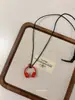 Colar com Pingente de Fone de Ouvido Preto para Mulheres Estilo Ins Corrente Longa para Suéter com Decote Halter Acessórios de Nicho Novos 2025