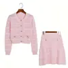 Conjunto de Dos Piezas de Punto Estilo Academia al por Mayor Cardigan de Manga Larga con Cuello Redondo Calado Lazo de Cinta Conjunto de Falda de Cintura Alta