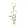 Serie de animales transfronterizos llavero colgante de boa constrictor colgante de bolsa de diamantes retro personalidad temperamento regalo pequeño
