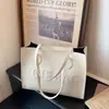 2026 Nuevo Modelo Textura de Letra en Relieve Gran Capacidad de Moda Verano Vintage Bolso Tote de Hombro Único para Viajes y Uso Diario para Mujeres