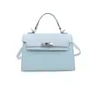 Outono 2026 Nova Bolsa Kelly Bolsa de Mão Fresca de Alto Padrão Bolsa Transversal Feminina Bolsa de Design Nicho com Sensação de Alto Padrão bolsas