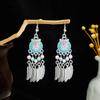 Pendientes geométricos redondos de estilo étnico transfronterizo europeo y americano, con borlas largas y atracciones turísticas retro bohemias.