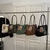 Bolsa Tote Casual de Grande Capacidade para o Dia a Dia de Mulheres 2026 Primavera Novo Estilo High-End Elegante Simples Ombro Axila