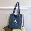 Nova bolsa tiracolo simples de jeans, bolsa de ombro versátil de grande capacidade, adequada para aulas particulares, compras e deslocamentos leves