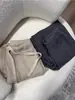 Pantalones de lana anchos para mujer, adecuados para otoño e invierno, con corte recto, caída fluida y textura de punto de cachemir, creando un efecto hasta el suelo.