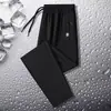 Pantalones casuales para hombre, de seda de hielo, finos, de secado rápido, deportivos, holgados, de talla grande, de primavera y otoño, de pierna recta.
