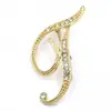 Temperamento de comercio exterior europeo y americano 26 broches de letras inglesas femenina diamante personalidad Joker moda corsage pin masculino accesorios