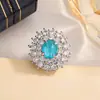 Anillo Elegante de Zirconia Azul Claro de Lujo Accesible con Zafiro Retro de Gama Alta y Imitación de Algodón Paraíba Natural